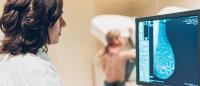 doctor looking at a mammography image